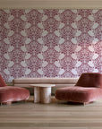 Petal Symphony Rosewood baroque damask wallpaper in a boutique hotel sitting area