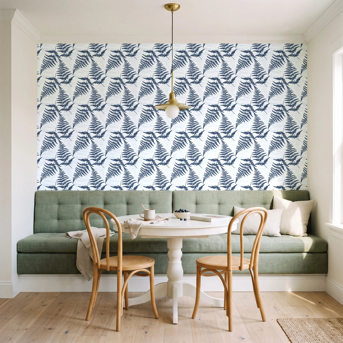 Pewter Fern Navy fern wallpaper as a feature wall in a sunlit breakfast nook