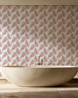 Pewter Fern Terracotta fern wallpaper creating ambiance in a serene spa bathroom