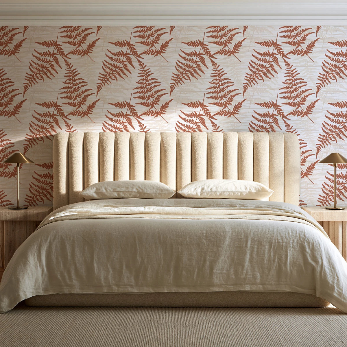 Pewter Fern Terracotta fern wallpaper behind a channel-tufted bed in a calm primary bedroom