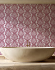Poet's Blossom Dusty Rose classic damask wallpaper creating ambiance in a serene spa bathroom