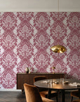 Poet's Blossom Dusty Rose classic damask wallpaper in an elegant dining room