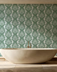 Poet's Blossom Sage classic damask wallpaper creating ambiance in a serene spa bathroom
