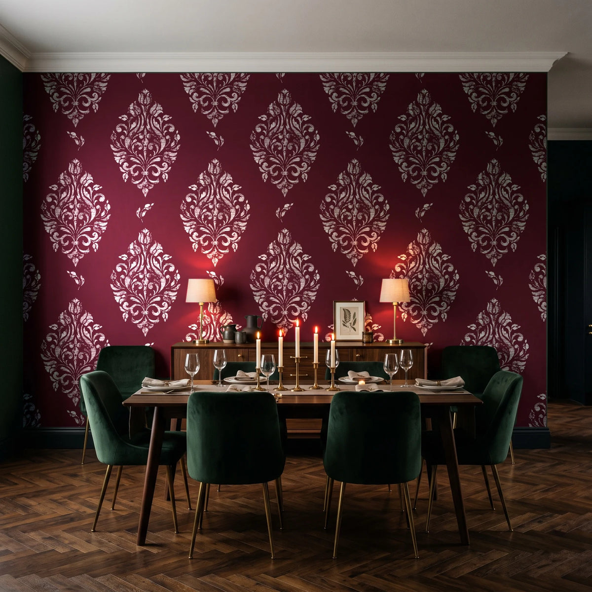 Porcelain Bouquet Oxblood damask wallpaper in a dark moody dining room with a candlelit table