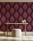 Porcelain Bouquet Oxblood damask wallpaper on the wall of a grand entry foyer
