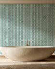 Porcelain Filigree Emerald filigree damask wallpaper creating ambiance in a serene spa bathroom