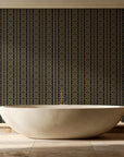 Porcelain Filigree Noir filigree damask wallpaper creating ambiance in a serene spa bathroom