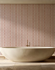 Porcelain Filigree Terracotta filigree damask wallpaper creating ambiance in a serene spa bathroom