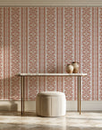 Porcelain Filigree Terracotta filigree damask wallpaper on the wall of a grand entry foyer