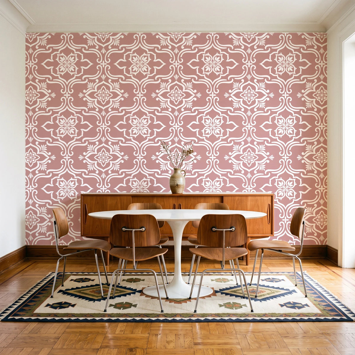 Pure Fern Fantasy Dusty Rose fern medallion wallpaper in a mid-century dining room with a teak sideboard and tulip table