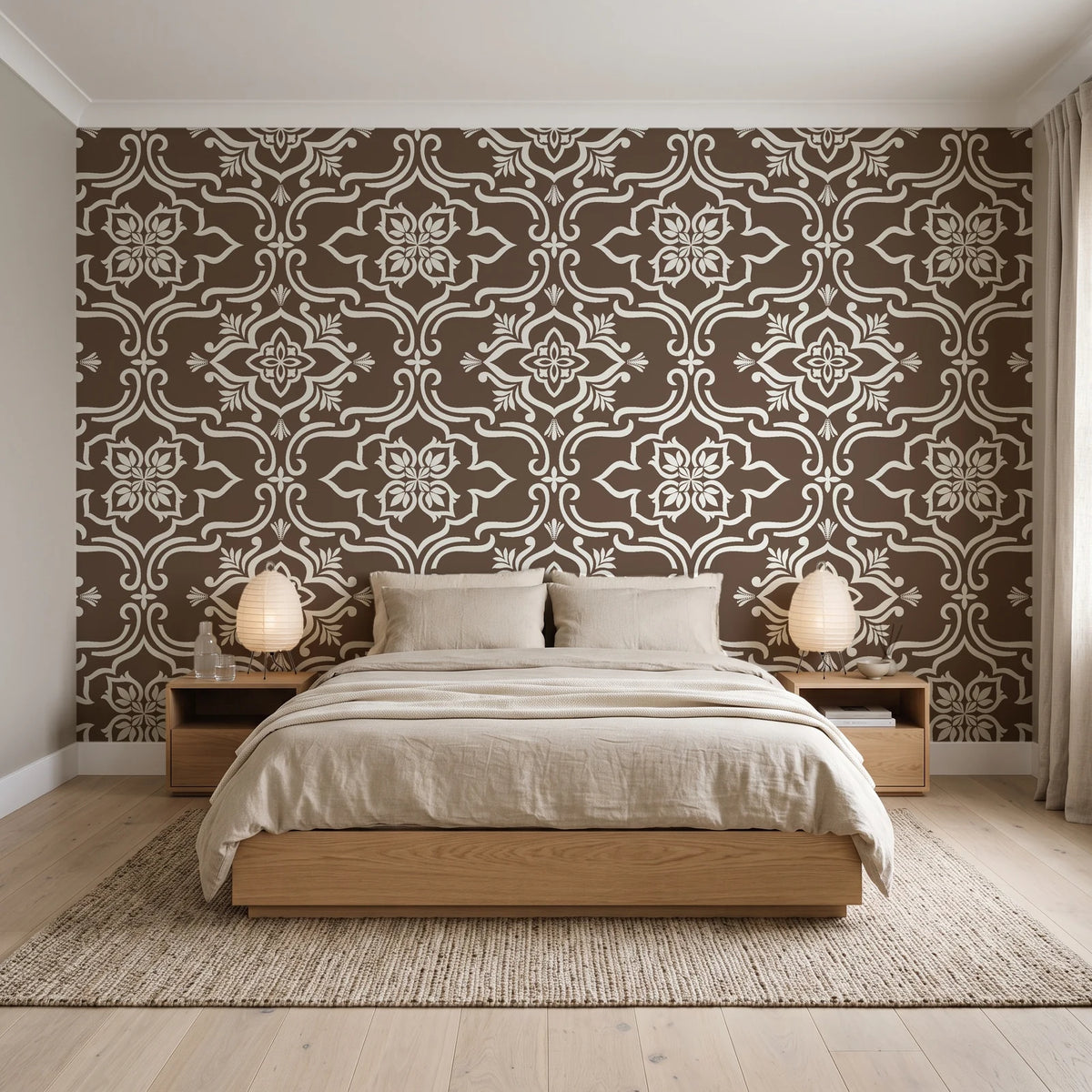 Pure Fern Fantasy Mocha fern medallion wallpaper behind a low platform bed in a serene Japandi bedroom
