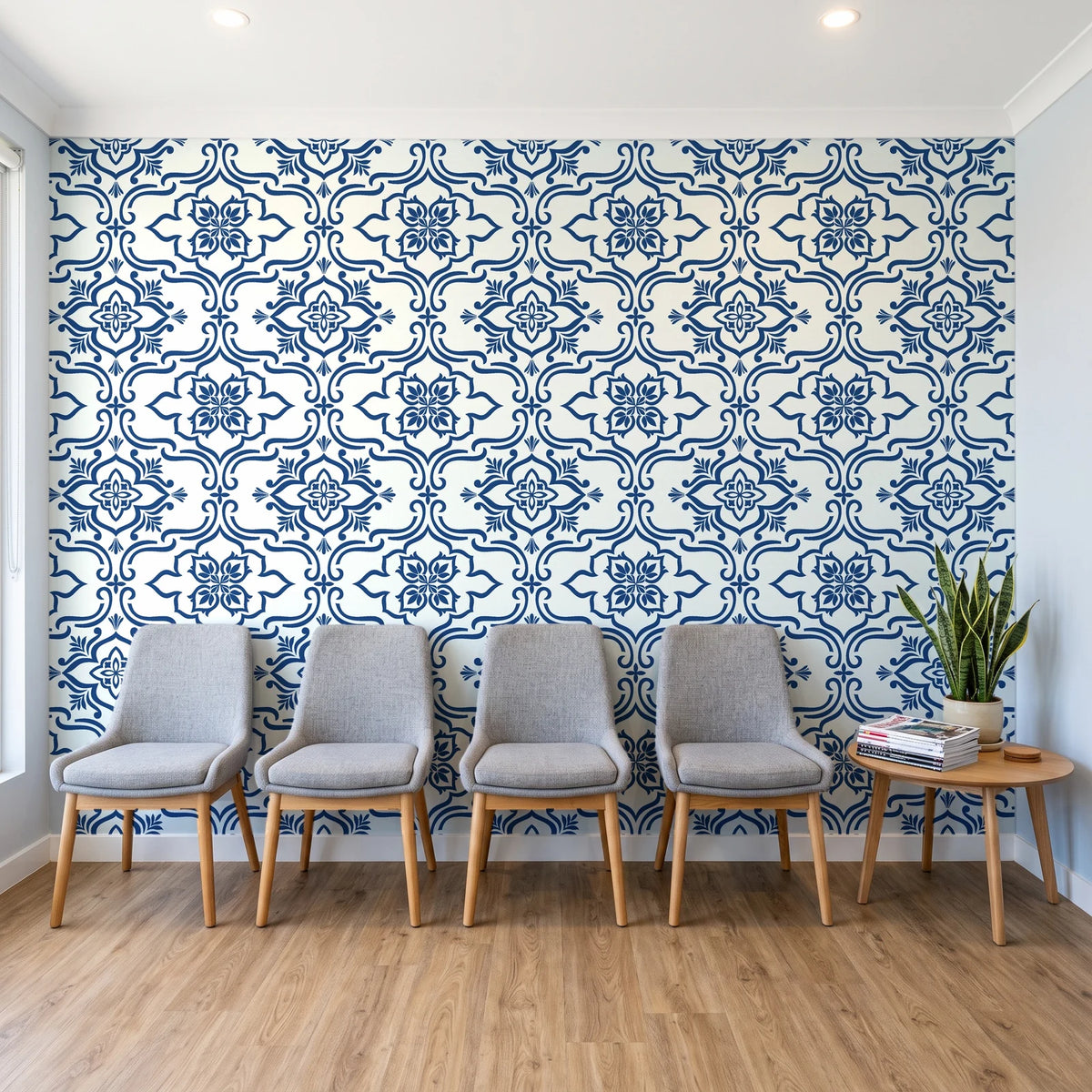 Pure Fern Fantasy Porcelain fern medallion wallpaper behind a row of upholstered chairs in a bright clinic waiting room