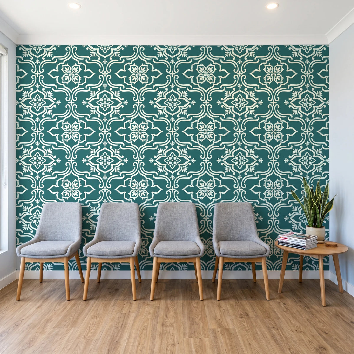 Pure Fern Fantasy Teal fern medallion wallpaper behind a row of upholstered chairs in a bright clinic waiting room