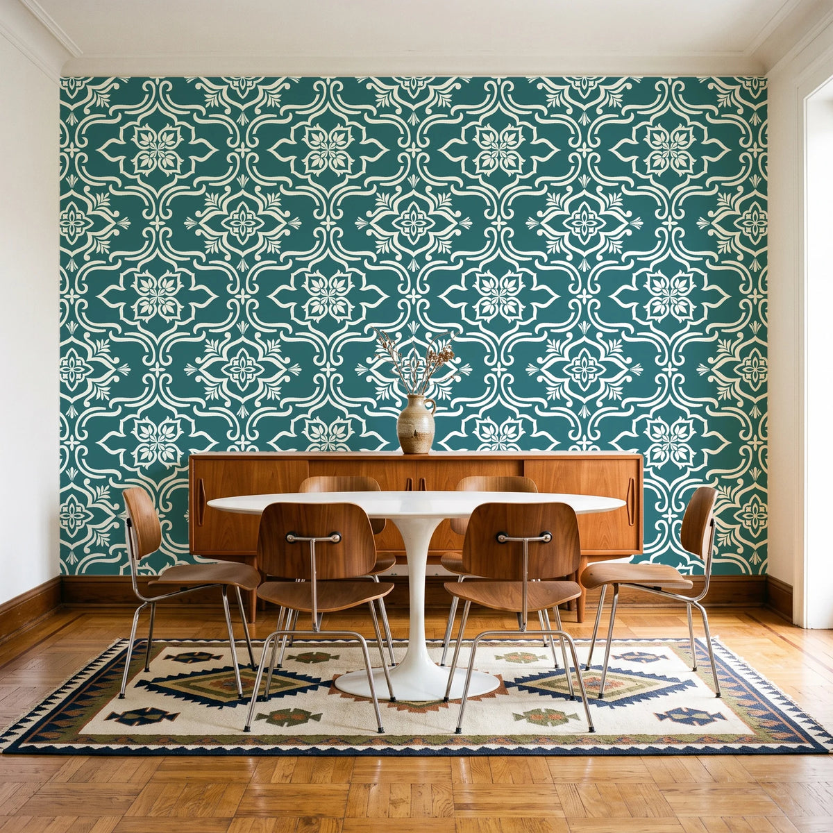 Pure Fern Fantasy Teal fern medallion wallpaper in a mid-century dining room with a teak sideboard and tulip table