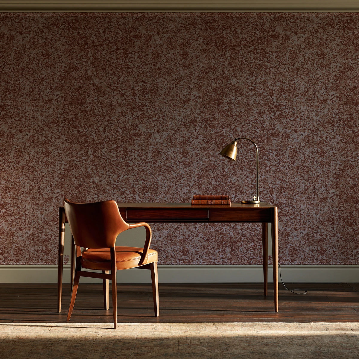 Quiet Camo Terracotta abstract wallpaper as a feature wall in a home study