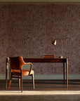 Quiet Camo Terracotta abstract wallpaper as a feature wall in a home study