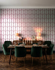 Quiet Grace Oxblood minimalist arch wallpaper in a dark moody dining room with a candlelit table