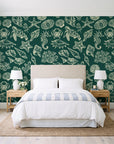 Quiet Reef Emerald sea life wallpaper behind a queen bed in a bright coastal bedroom
