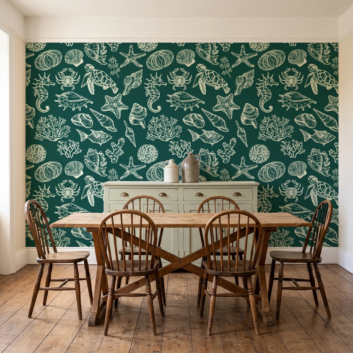Quiet Reef Emerald sea life wallpaper in a farmhouse dining room with a sage sideboard and rustic trestle table