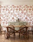 Quiet Reef Terracotta sea life wallpaper in a farmhouse dining room with a sage sideboard and rustic trestle table
