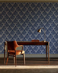 Rising Arrow Indigo geometric wallpaper as a feature wall in a home study