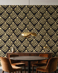 Rising Arrow Noir geometric wallpaper behind a walnut credenza and round table in an elegant dining room