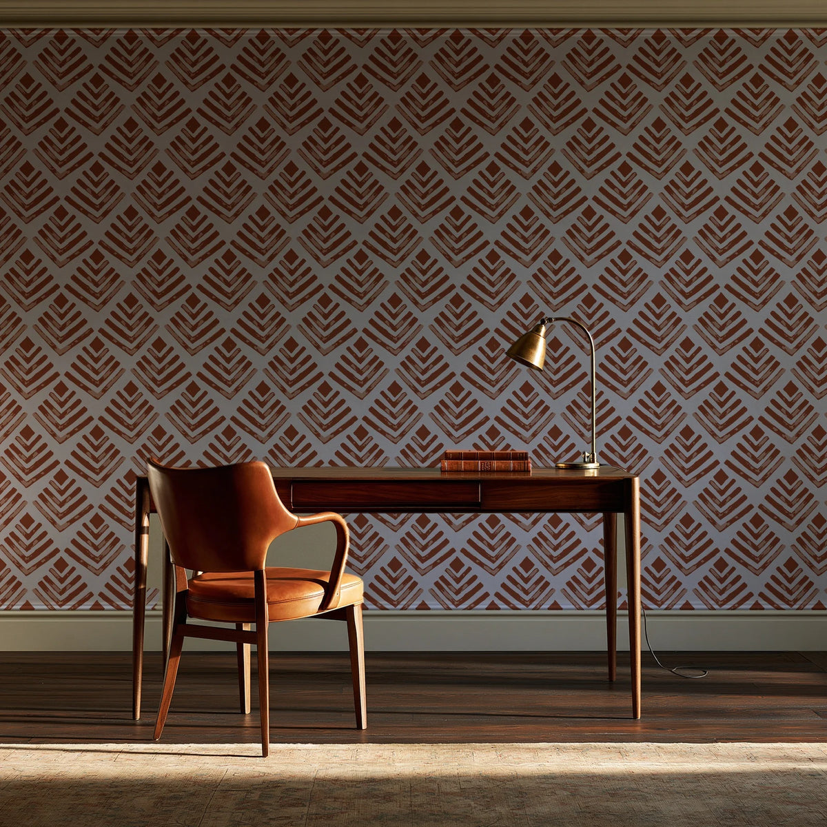Rising Arrow Terracotta geometric wallpaper as a feature wall in a home study