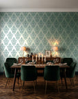Rosewater Retreat Emerald damask wallpaper in a dark moody dining room with a candlelit table