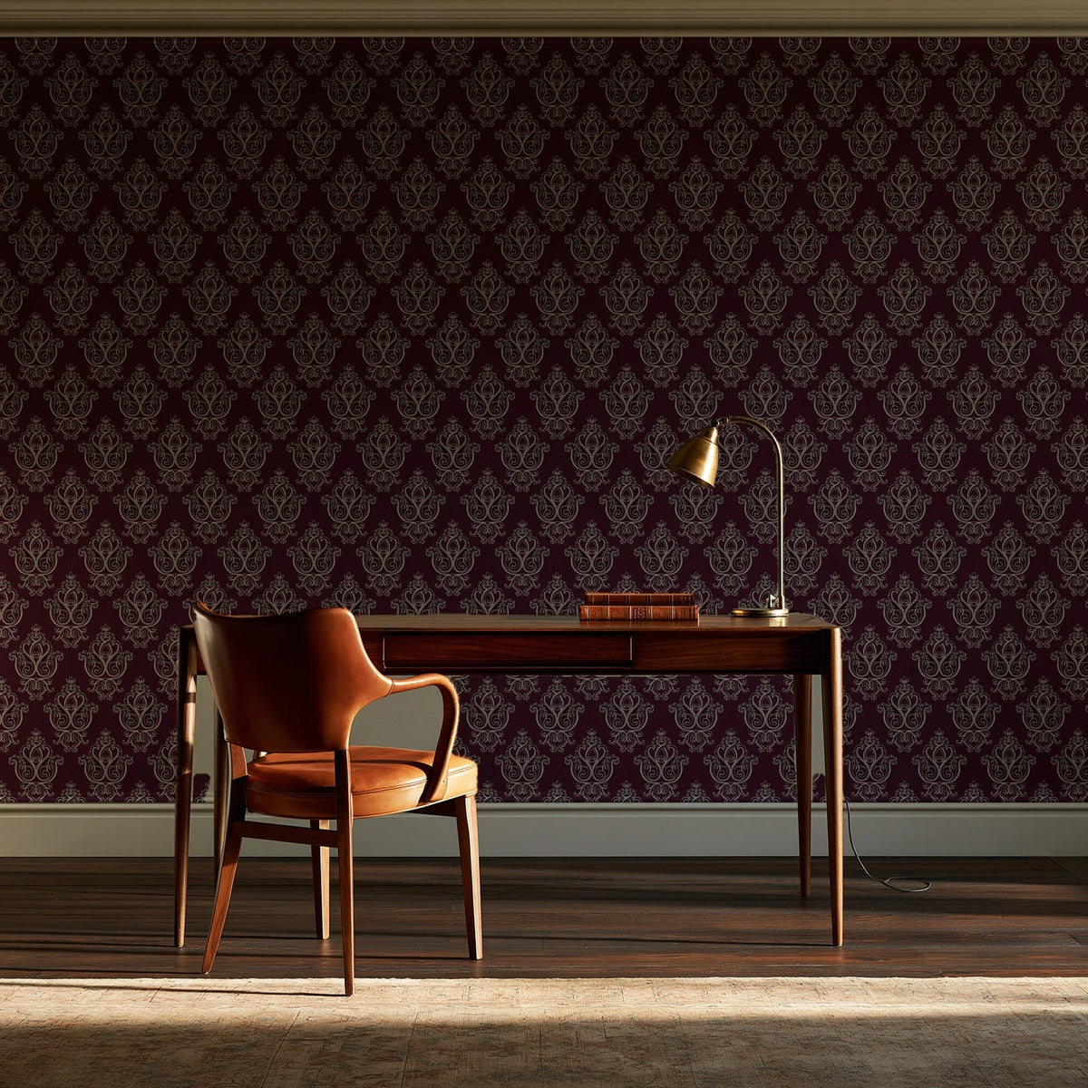 Rosewater Retreat Oxblood damask wallpaper as a feature wall in a home study