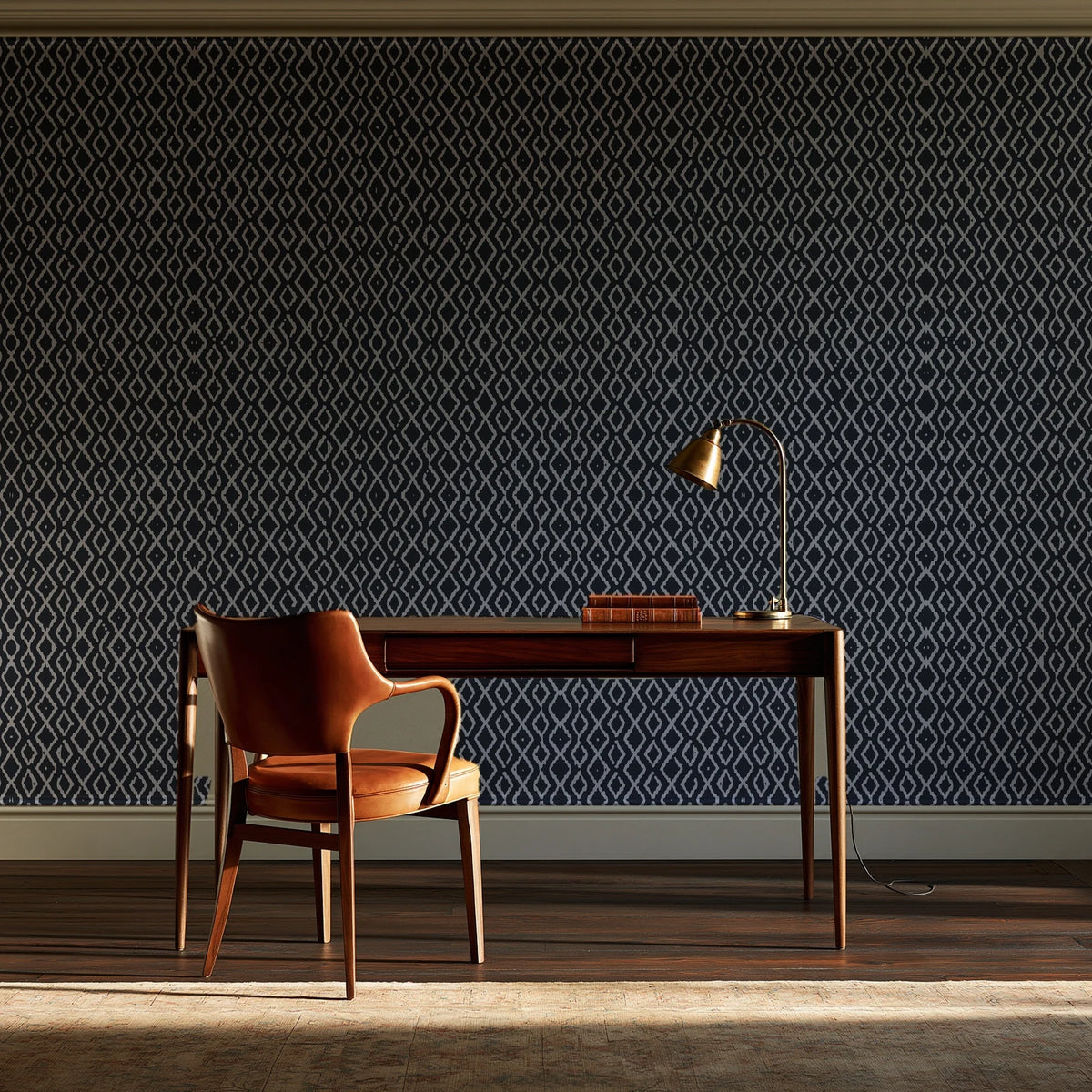 Sage Trellis Charcoal geometric wallpaper as a feature wall in a home study