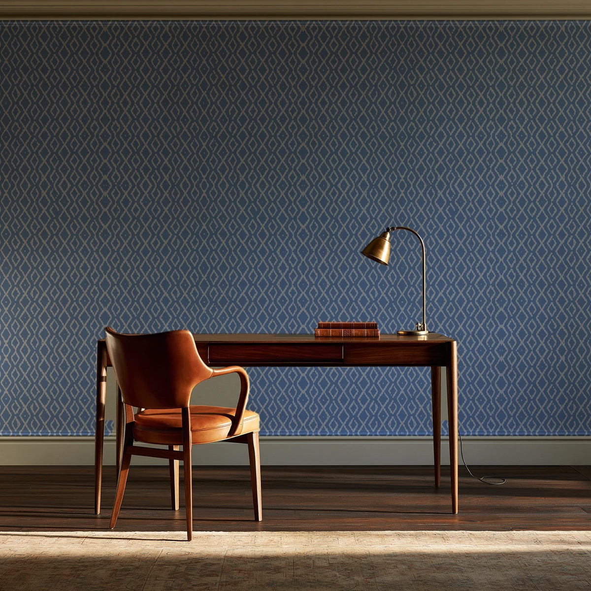 Sage Trellis Dusty Blue geometric wallpaper as a feature wall in a home study