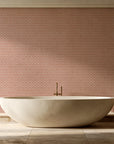 Sage Trellis Terracotta geometric wallpaper creating ambiance in a serene spa bathroom