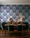 Secret Arbor Midnight damask wallpaper in a dark moody dining room with a candlelit table