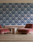 Secret Arbor Midnight damask wallpaper in a boutique hotel sitting area