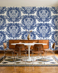 Serene Blossom Indigo damask wallpaper in a mid-century dining room with a teak sideboard and tulip table