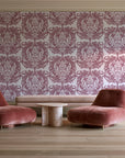 Serene Blossom Rose damask wallpaper in a boutique hotel sitting area