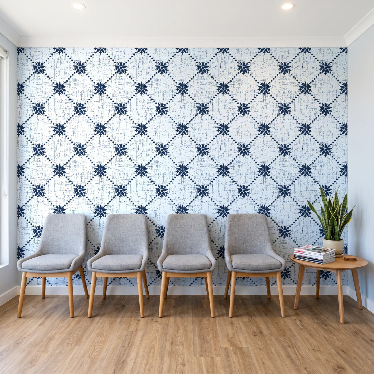 Shadow Garden Navy lattice floral wallpaper behind a row of upholstered chairs in a bright clinic waiting room