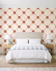 Shadow Garden Terracotta lattice floral wallpaper behind a queen bed in a bright coastal bedroom