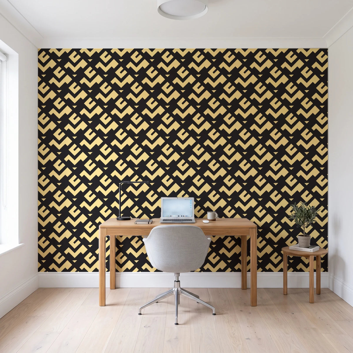 Signal & Edge Noir geometric wallpaper behind a modern oak desk in a bright home office