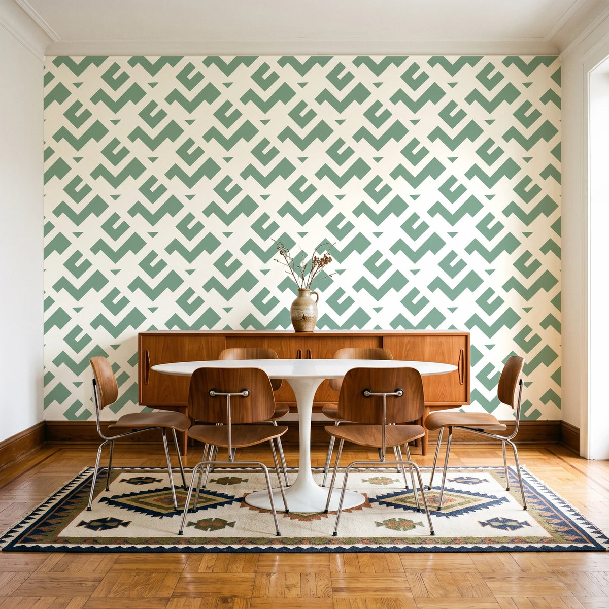 Signal & Edge Sage geometric wallpaper in a mid-century dining room with a teak sideboard and tulip table
