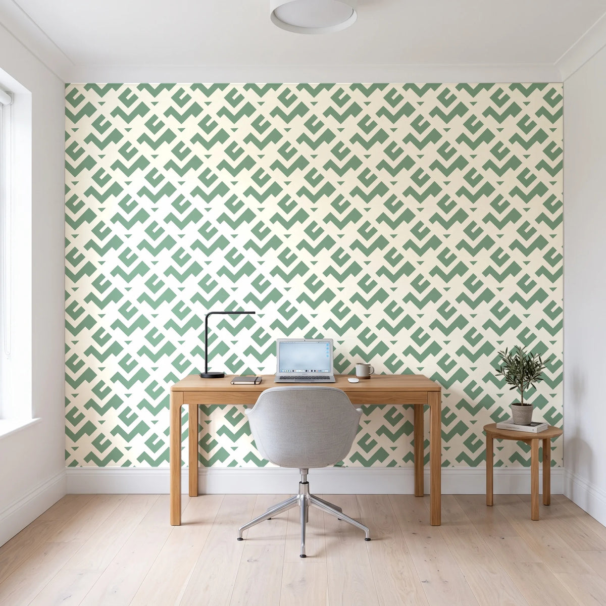 Signal & Edge Sage geometric wallpaper behind a modern oak desk in a bright home office