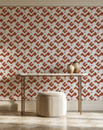 Signal & Edge Terracotta geometric wallpaper on the wall of a grand entry foyer