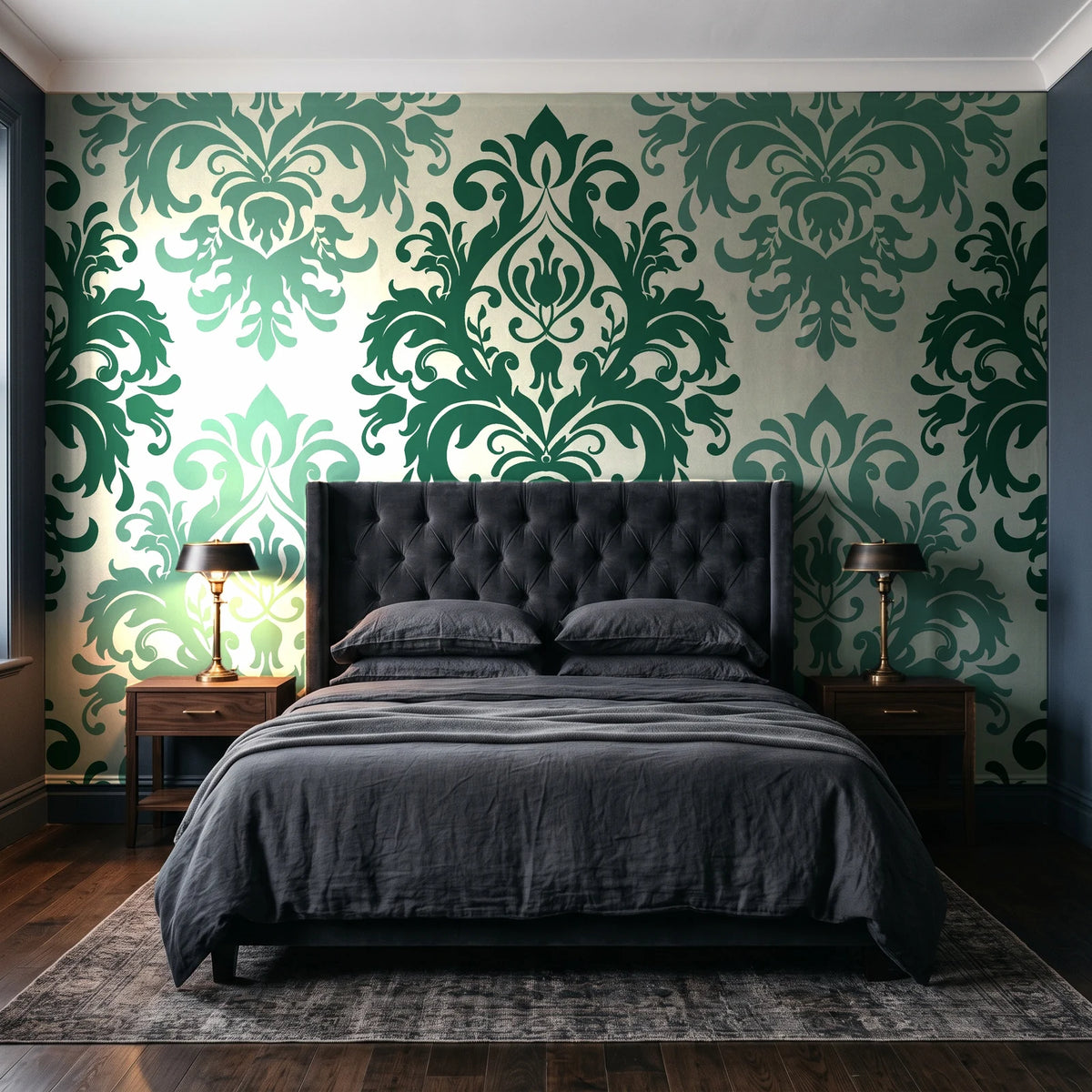 Silent Bouquet Emerald damask wallpaper behind a tufted headboard in a dark, moody bedroom