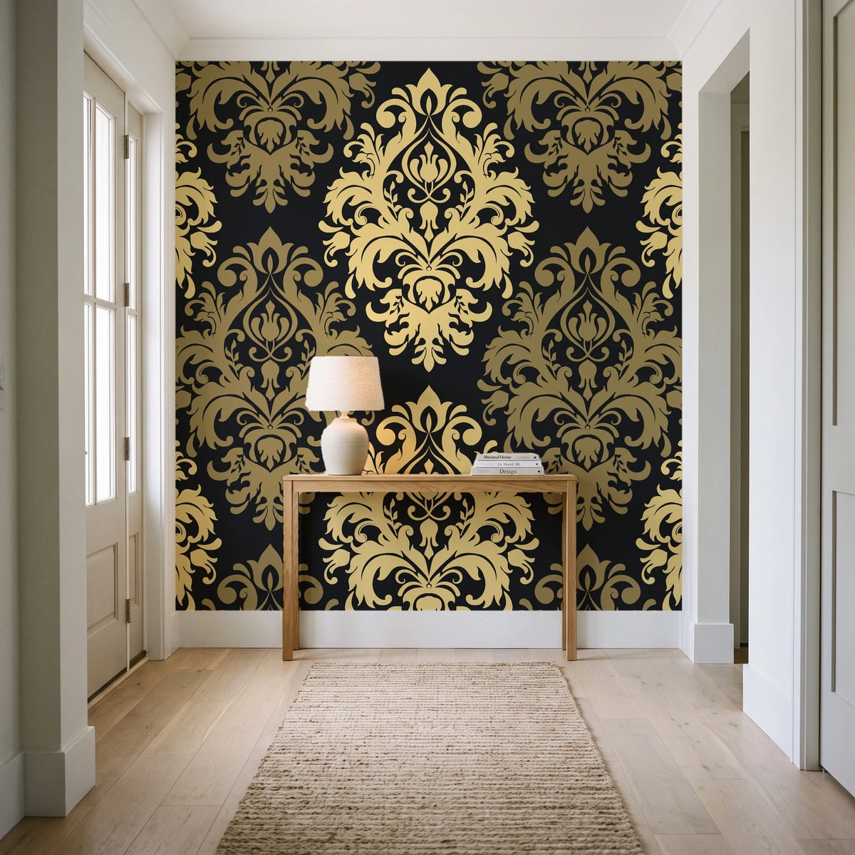 Silent Bouquet Noir damask wallpaper behind a console table in a light entry hallway