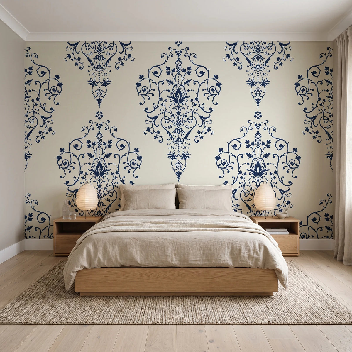 Silent Spring Navy damask wallpaper behind a low platform bed in a serene Japandi bedroom