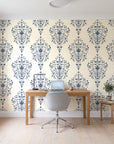 Silent Spring Navy damask wallpaper behind a modern oak desk in a bright home office