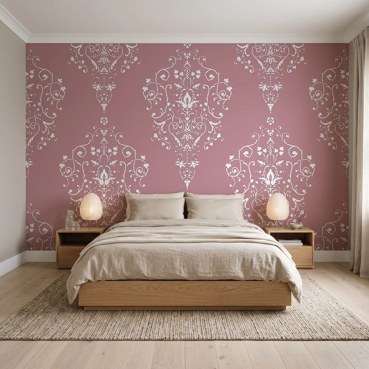 Silent Spring Rose damask wallpaper behind a low platform bed in a serene Japandi bedroom