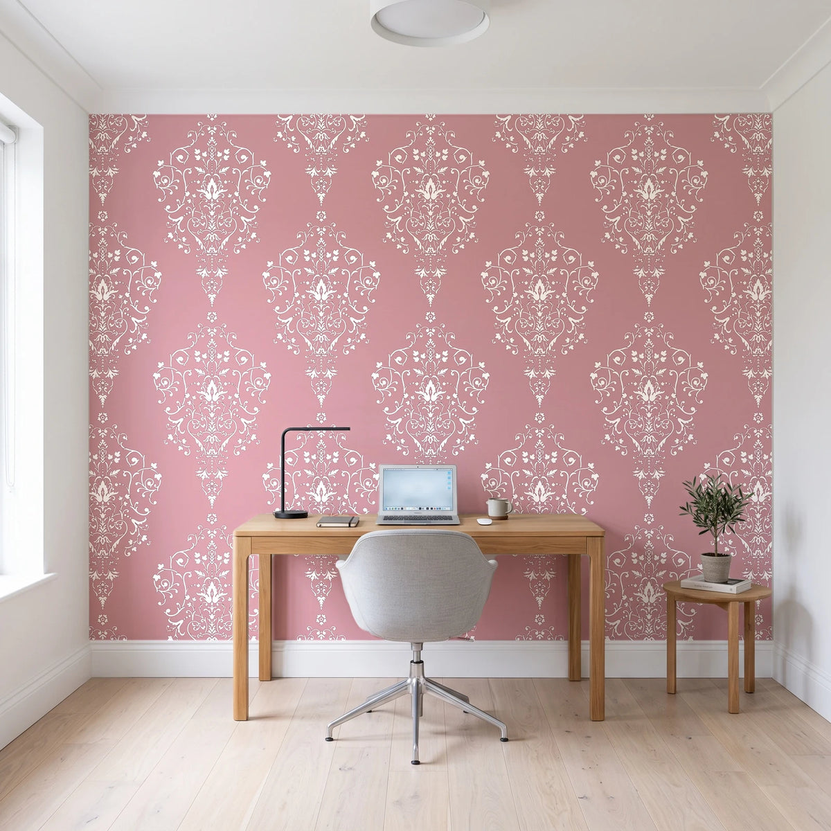 Silent Spring Rose damask wallpaper behind a modern oak desk in a bright home office
