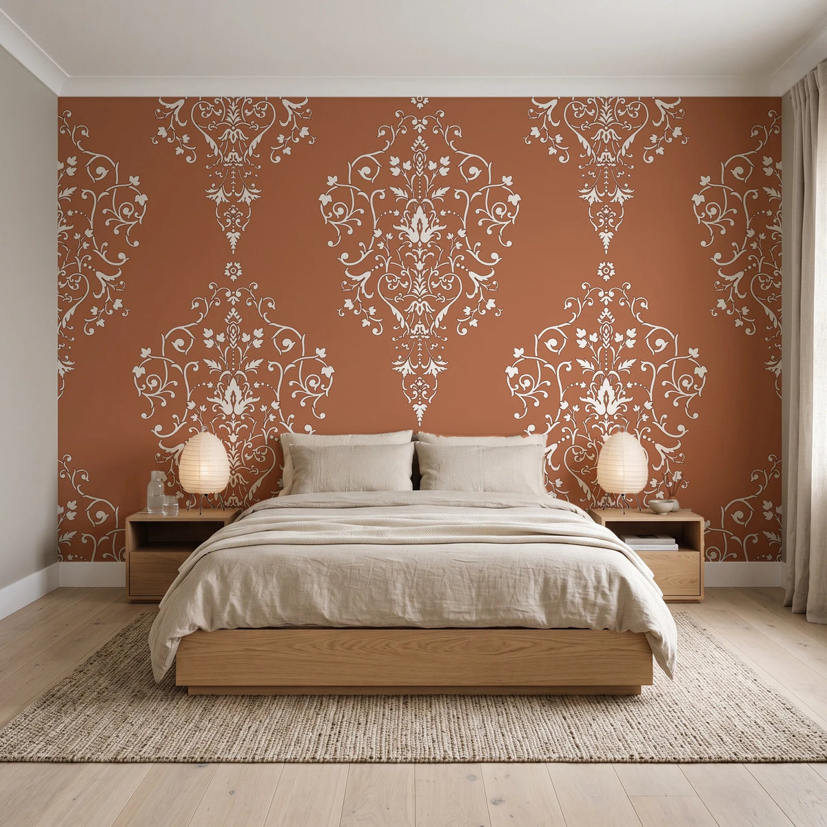 Silent Spring Terracotta damask wallpaper behind a low platform bed in a serene Japandi bedroom