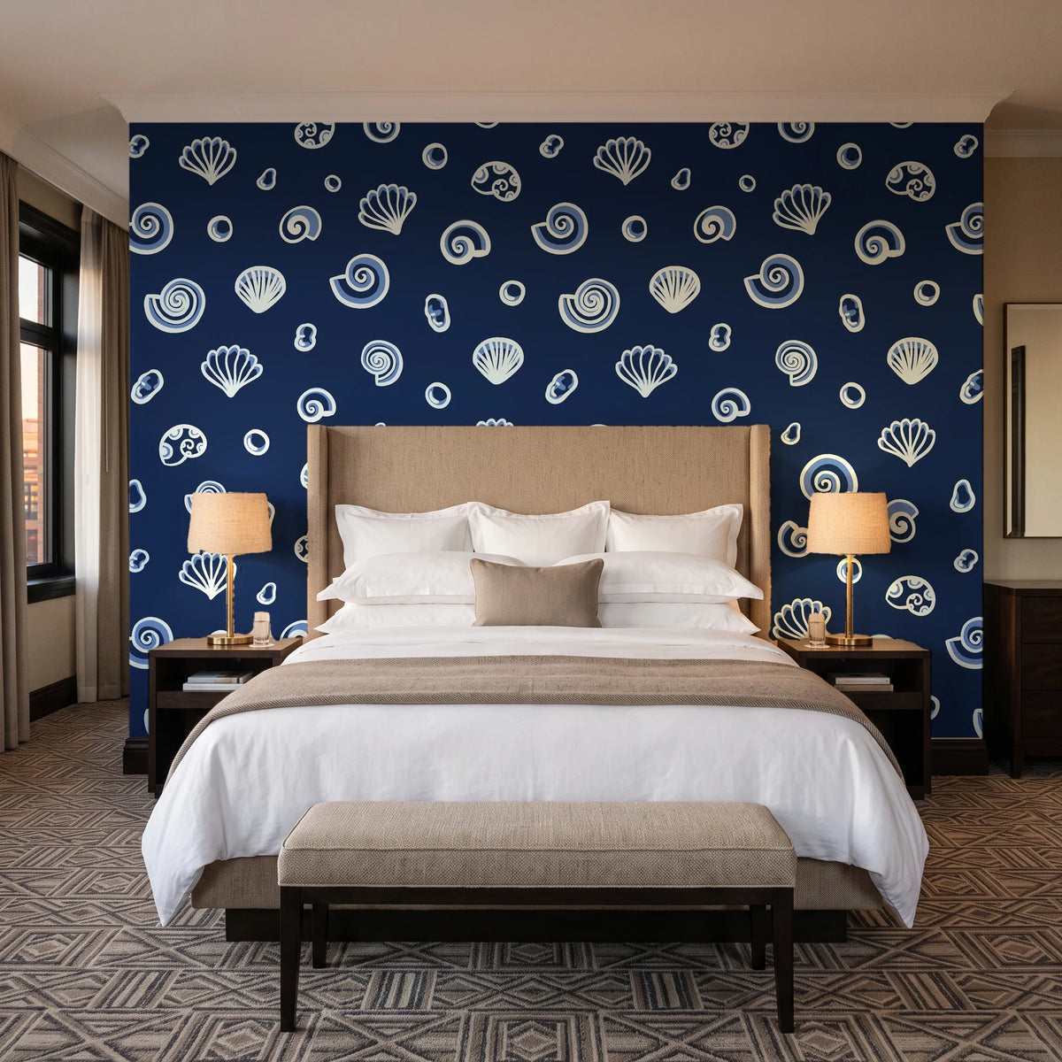 Sketched Seashells Midnight seashell wallpaper behind the headboard of a king bed in a contemporary hotel guest room